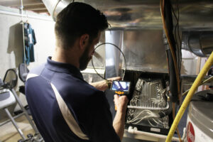 Breached Heat Exchanger Camera Inspection | Furnace Repair 