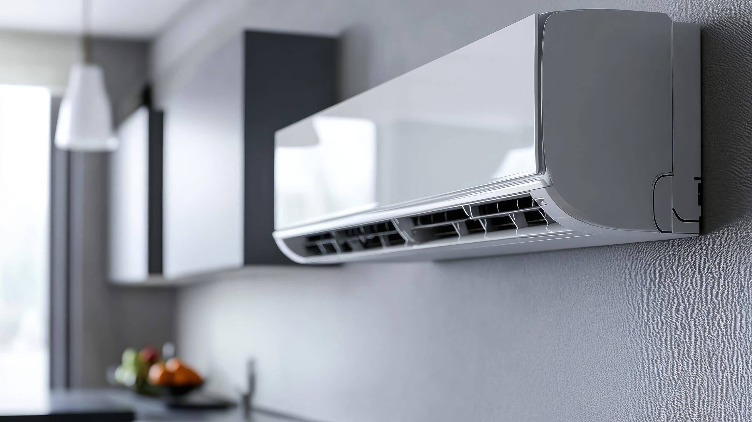 A wall-mounted ductless mini split head in a finished room